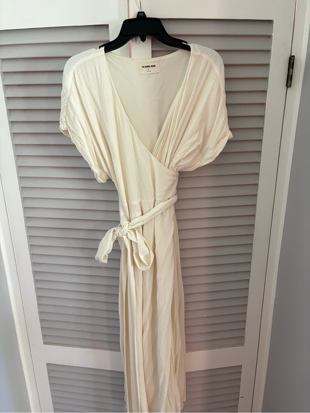 The Normal Brand Cream Wrap Dress